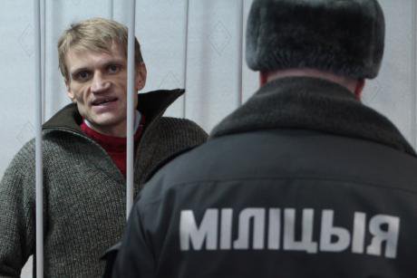 Belarusian prisoner Syarhei Kavalenko behind bars.