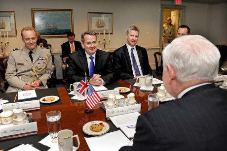 British Defense Minister Liam Fox (3rd from right) meets with Secretary of Defense Robert M. Gates (right) in the Pentagon.
