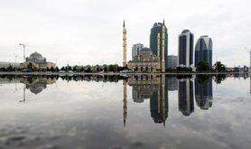 A rebuilt grozny showing a mosque and several new skyscrapers. 
