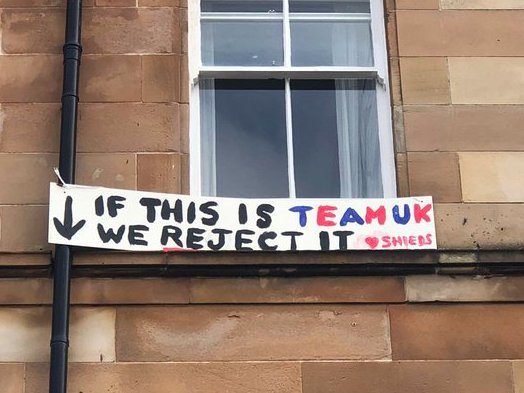 A banner reads 'If this is Team UK we reject it'