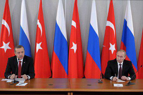 Erdogan meets Putin against backdrop of Turkish and Russian flags in St Petersburg.