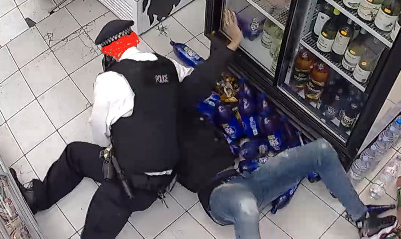 Charles Rashan taps the fridge door