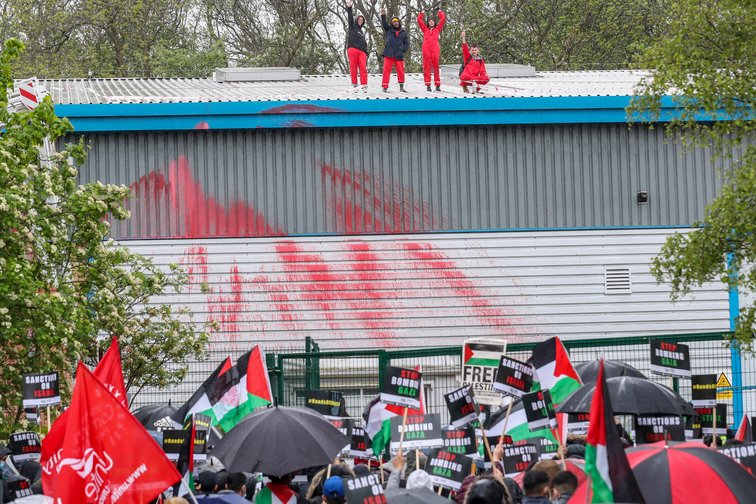 Leicester May 2021 locals gather to support activists who occupied the building of Israeli-owned Elbit Systems subsidiary UAV Tactical Systems  Vudi XhymshitiAnadolu Agency via Getty Images