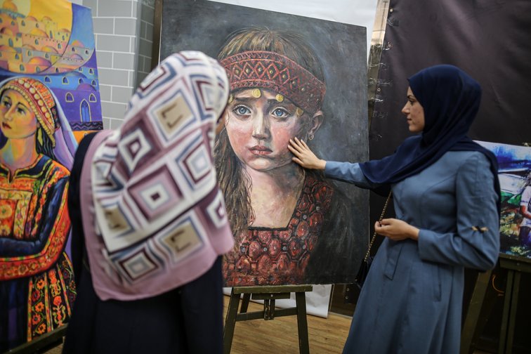 Palestinians in Gaza attend the opening of an exhibition in November 2022 to mark the 105th anniversary of the Balfour Declaration  Ali JadallahAnadolu Agency via Getty Images