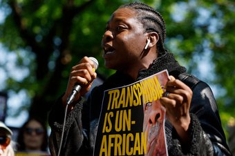 An activist delivers remarks at a protest outside the Ugandan Embassy over the Uganda's parliamentary Anti-Homosexuality Bill, 2023 on April 25, 2023 in Washington, DC| Getty Images