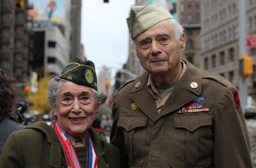 World War II veterans Margie Zwick, Women&#039;s Army Corps, and Arnold Strauch, U.S. Army, look on before the annual Veterans Day parade November 11, 2009 in New York City.  Mario Tama/Getty Images North America.