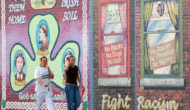 Girls on front of murals in belfast. Flickr:Anna & Michal. Some rights reserved.jpg