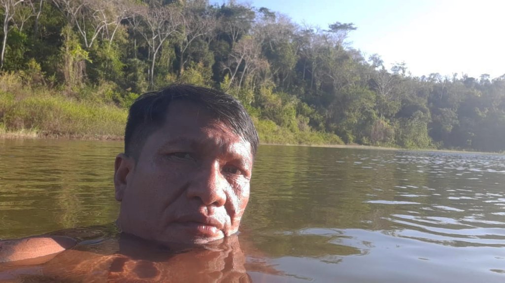 Olimpio Guajajara, the leader of the Guardians of the Forest, bathes in a river on Arariboia indigenous land in Maranhão