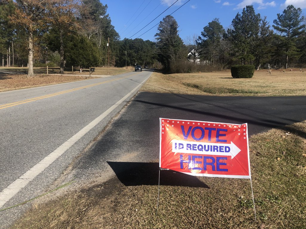 Barriers to voting: A sign outside a rural polling station in Georgia