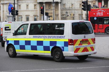 White van with immigration enforcement written on the side