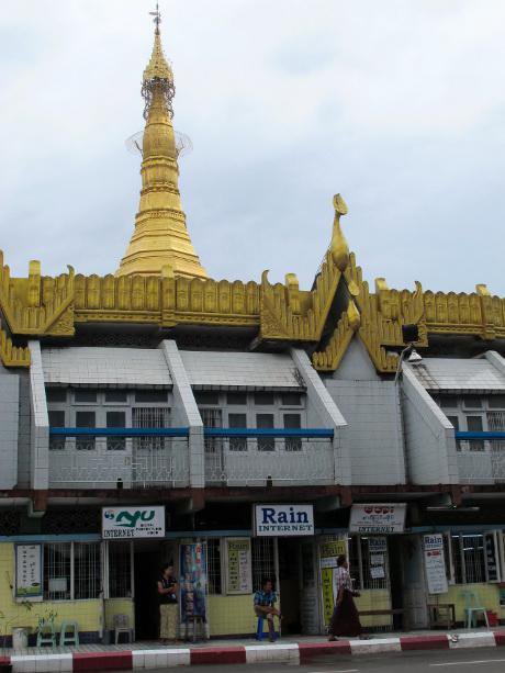 Road-side internet cafes with golden pagoda in background