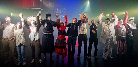 Juliano Mer Khamis (centre) takes a bow with the cast of Alice in Wonderland at The Freedom Theatre, Jenin