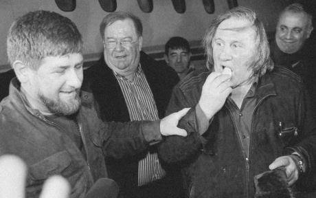 Ramzan Kadyrov with Gerard Depardeiu, eating a crisp.