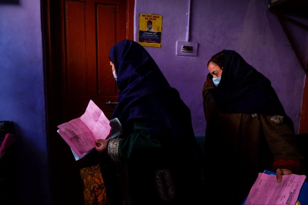 Women waiting at the psychiatric department at the government hospital in Pulwama