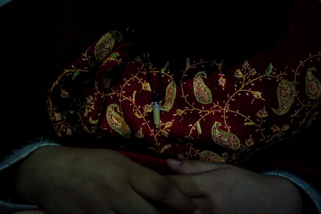 Insha never removes the amulet she was given by a faith healer