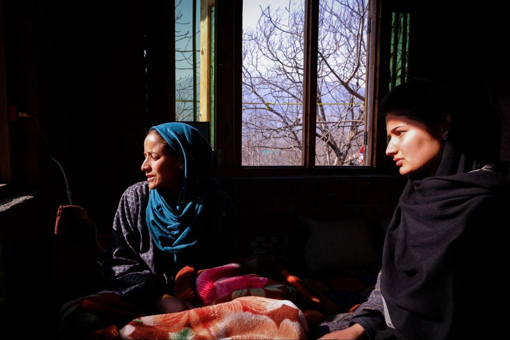 Naseema (left) at her house in Grandwan with her daughter, Shazia