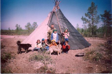 Khanty_in_front_of_Chum_near_Lake_Numto Irina Kazanskaya 2006 (1) 460.jpg