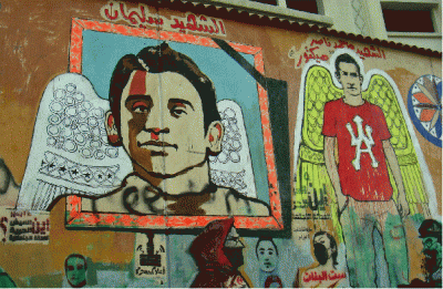 Male figures with angels&#39;s wings. One wearing red El Ahly tee-shirt