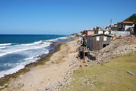A Puerto Rican slum next to the ocean.