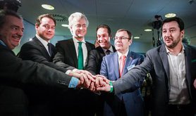 Leaders of European Eurosceptic groups talk at the the Federal Congress of Lega Nord, unity symbolized by one hand atop another