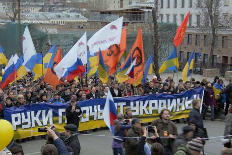 'March for Peace' on 15 March 2014 in Moscow. Banner reads 'Hands off Ukraine.'