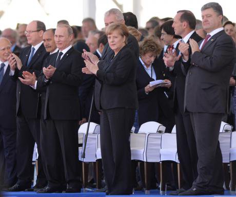Vladimir Putin, Angela Merkel, Petro Poroshenko, D-Day 70th anniversary, June 2014, Ouistreham, France. Demotix/Art Widak 
