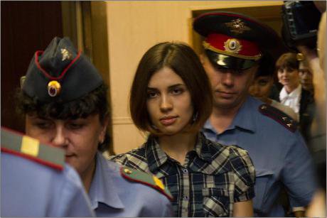 Tolokonnikova escorted by police during her trial.