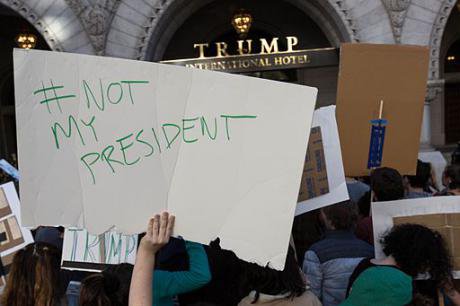 Not_My_President,_Protesters_outside_Trump_Hotel_on_Pennsylvania_Ave,_DC_(30603012530).jpg