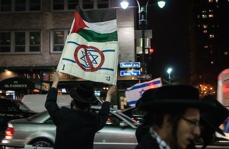 Orthodox Jews protest in support of Palestinians in New York City. Demotix/Angel Zayas. All rights reserved.