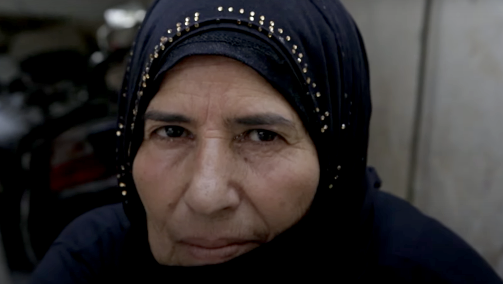Oum Khalid, Lebanese vegetable seller, in the documentary 'State of Absence'