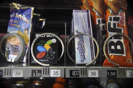 Vending machine with snacks and condoms, Berlin, Germany.