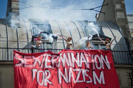 FEMEN protest during a demonstration of far-right nationalist groups in Paris, 2013.