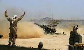Iraqi security forces fire artillery, Fallujah, 29 May 2016. Anmar Khalil/AP/Press Association. All rights reserved.