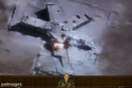 Footage of a Syrian airstrike. Ivan Sekretarev / AP/Press Association Images