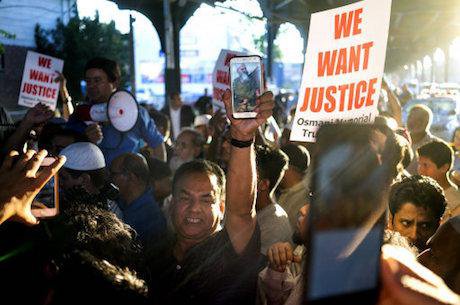 Demonstration for justice after shootings of Akonjee and Udin, 2016. AP Photo/PA Images/Craig Ruttle. All rights reserved.