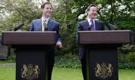 Nick Clegg and David Cameron at the first press conference of their coalition government