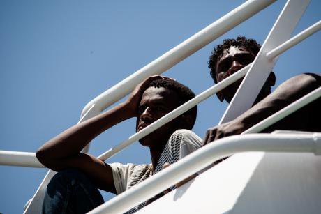 Migrants on a boat near Salerno, Italy.