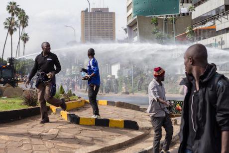 Nairobi police use water cannon on a crowd during post-election unrest in 2017