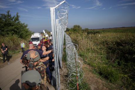 A barbed-wire fence at the Hungarian border