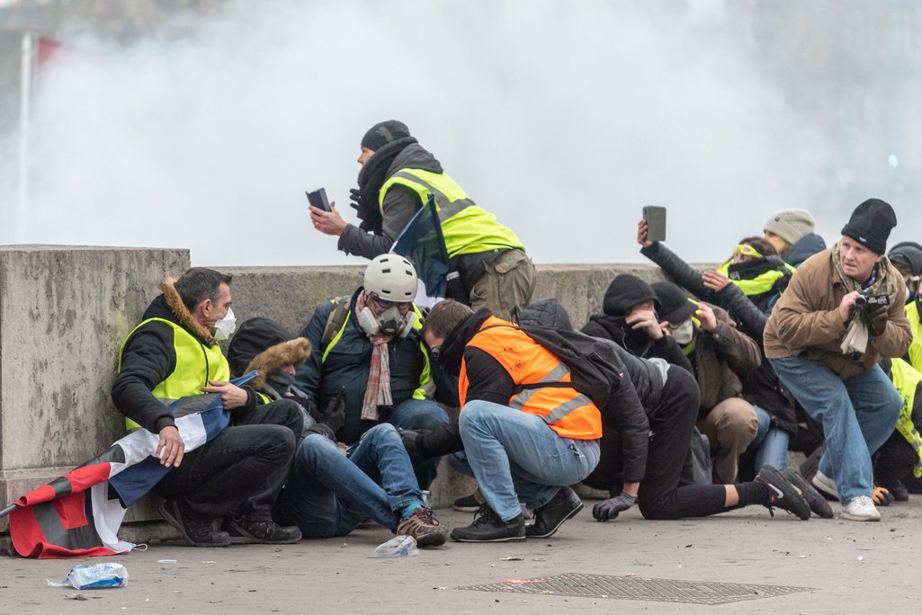 Protesters avoiding police fire, Paris, January, 2019.
