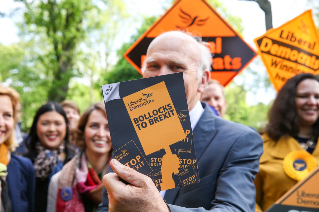 The leader of Liberal Democrats Vince Cable holding the party manifesto for the forthcoming European Elections