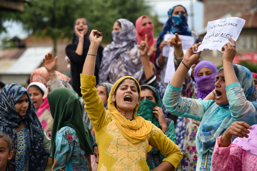 Women in Kashmir lead a chant in a protest against India’s revocation of Kashmir’s autonomy.