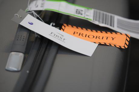First class and priority tags.