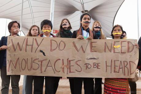Activists demanding women’s voices be heard at COP22.