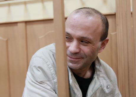 Dmitry Pavlyuchenkov sits in the dock during the first Politkovskaya trial in 2012.