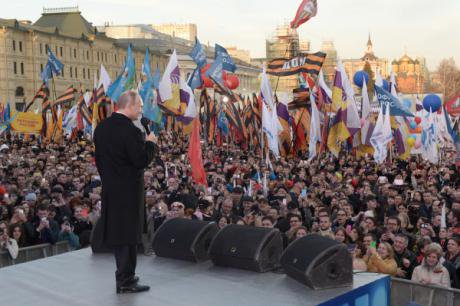 Putin addresses a crowd at a celebration of the one year anniversary of the 'return' of Crimea to Russia.