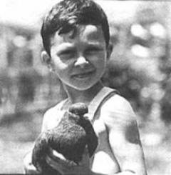 Russ-aged-5-with-pigeon_0.jpg