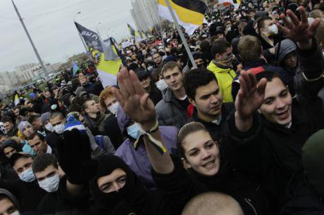 Russian nationalists give fascist salute at the &#39;Russian March&#39; in 2011 