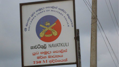 Sign post for the military police in Jaffna, in Sinhalese and English only