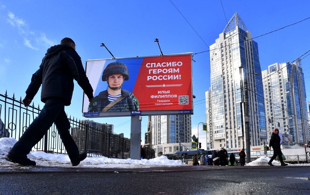 A billboard in St Petersburg depicts a Russian soldier next to the slogan “Thank you to the Heroes of Russia!”